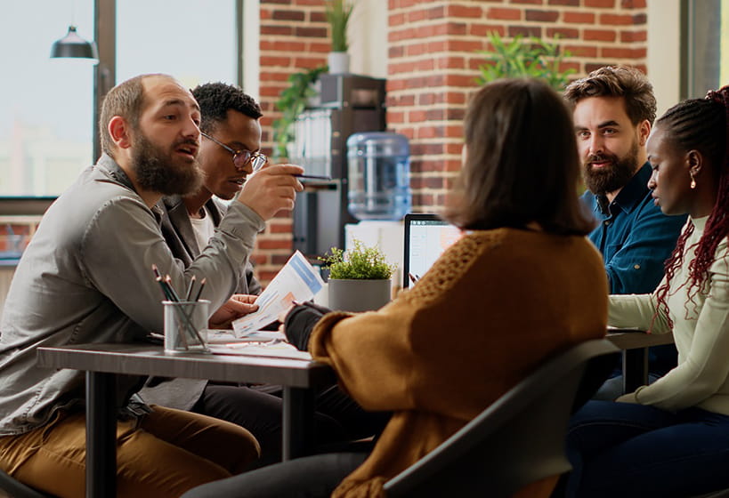 people seated having a group discussion