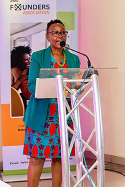 Catherine of SFA giving a speech at Founders Exchange Marketplace